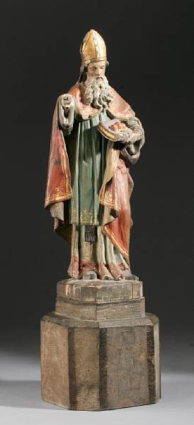 Appraisal: A Northern European polychrome and giltwood figure of St Nicholas