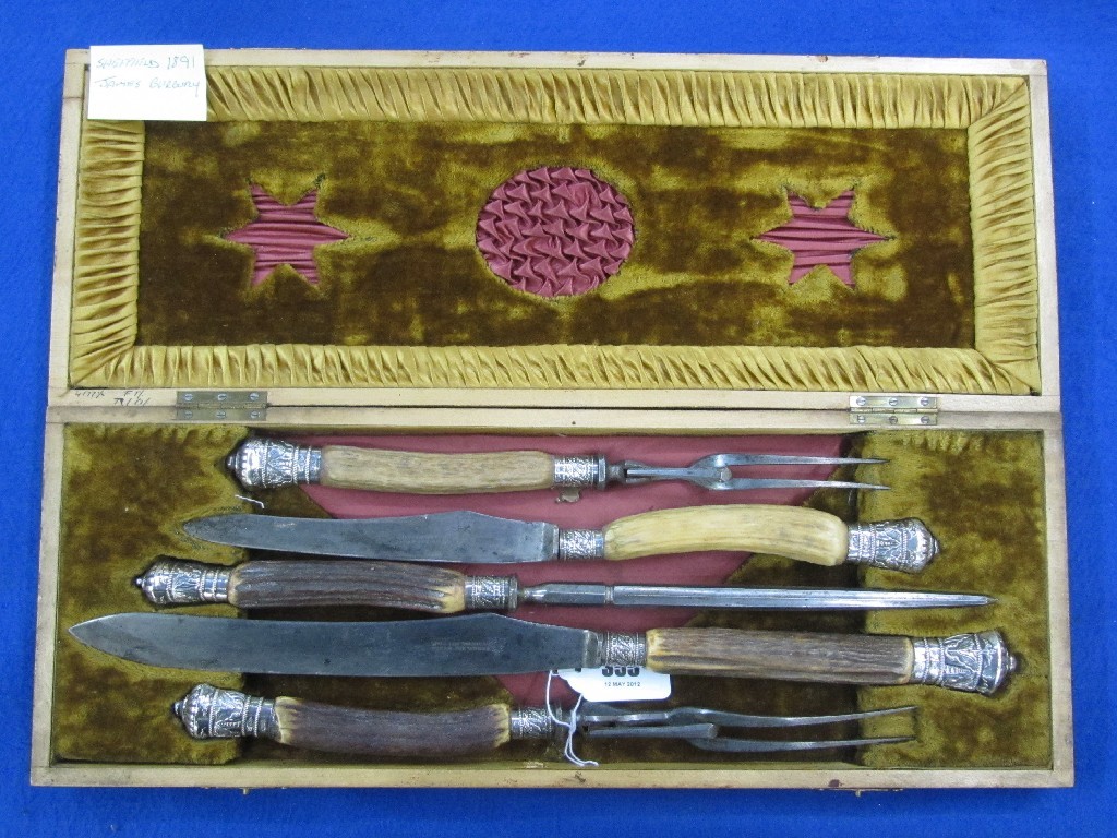 Appraisal: A cased five piece silver mounted bow handled carving set