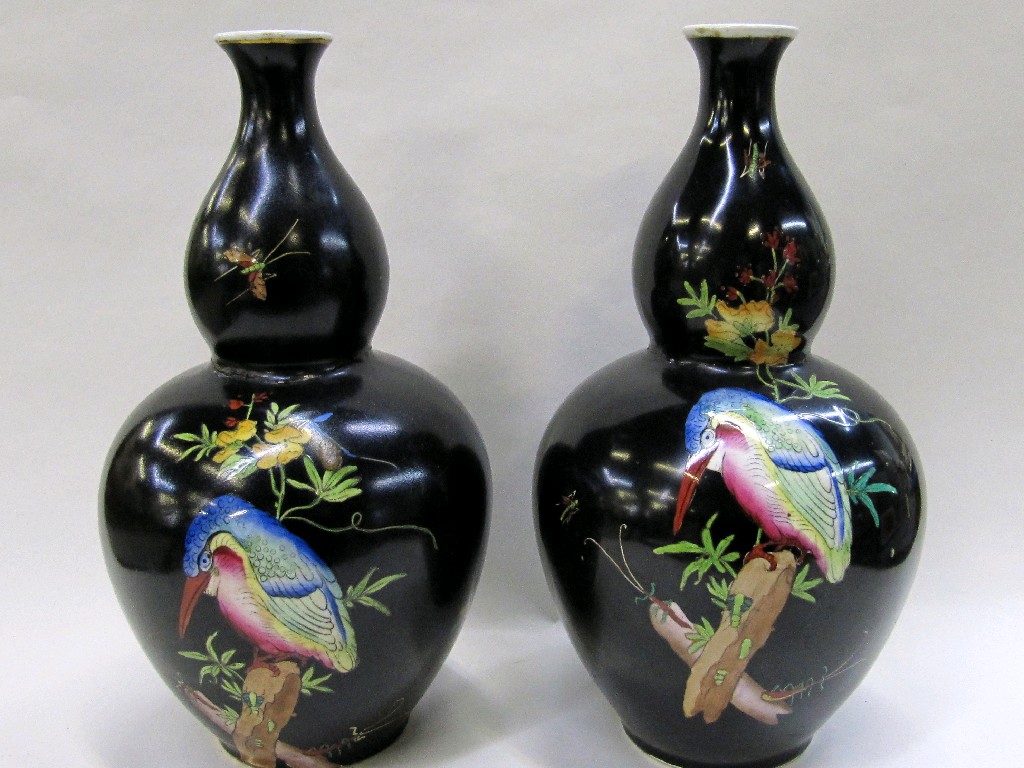 Appraisal: Pair of black glazed gourd shape Cetem ware vases decorated