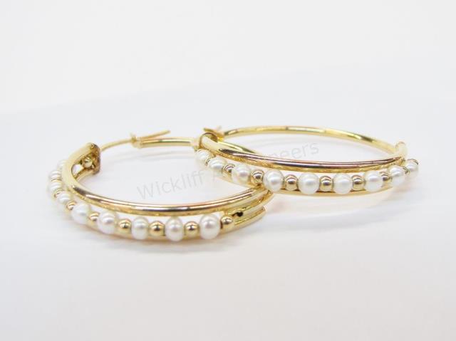 Appraisal: A pair of K yellow gold hoop earrings each with