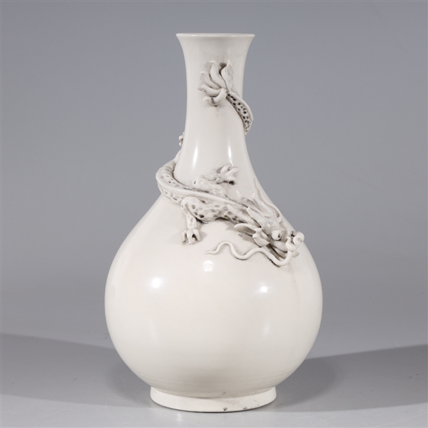 Appraisal: Chinese blanc de chine vase with molded dragon to body