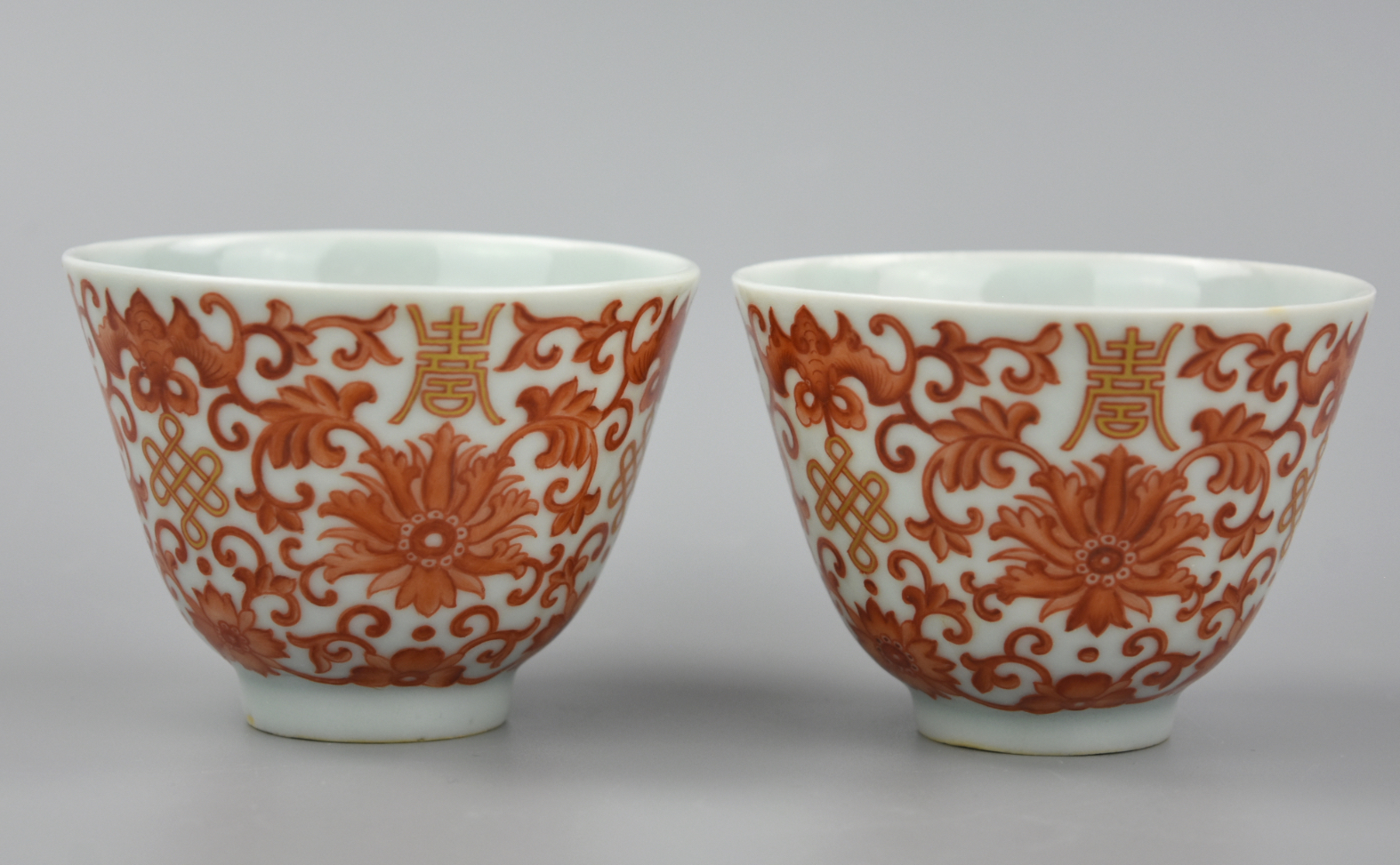 Appraisal: IMPERIAL CHINESE GILT IRON RED CUPS TONGZHI P a pair