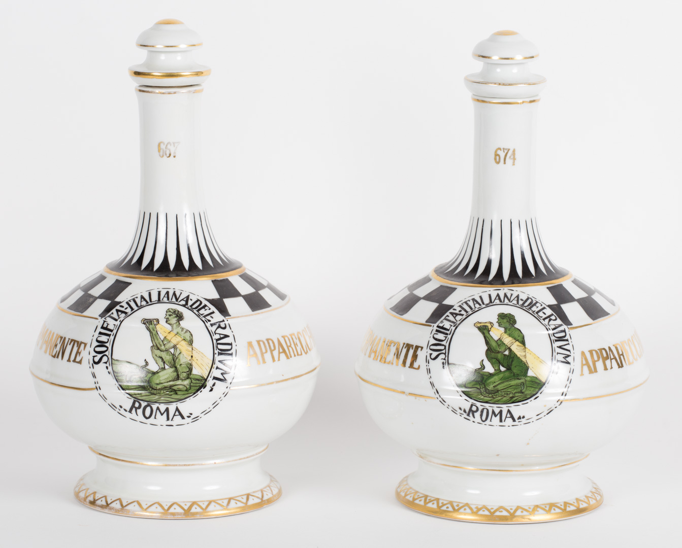 Appraisal: Pair Continental porcelain decanters th century each with painted and