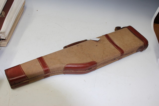 Appraisal: A CANVAS AND LEATHER MOUNTED LEG OF MUTTON SHOTGUN CASE