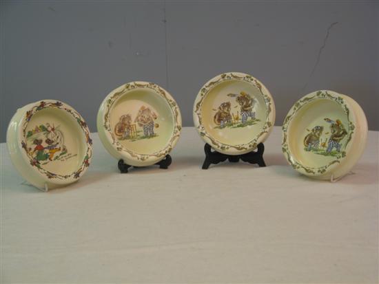 Appraisal: Three matching Falconware babies dishes with Koalas playing cricket diameter