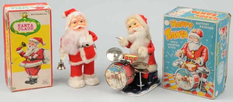 Appraisal: Lot of Santa Claus Toys Description Japanese Working Includes one