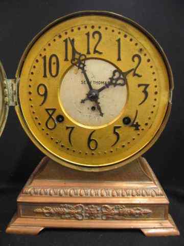 Appraisal: Seth Thomas Clock ship's style on copper finish base ''