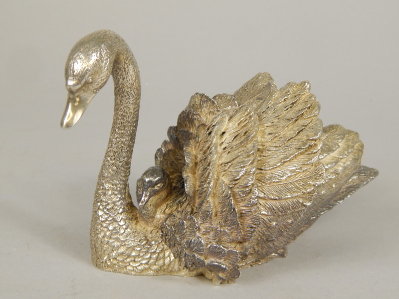 Appraisal: A thC figure group of swan and signets with plumage