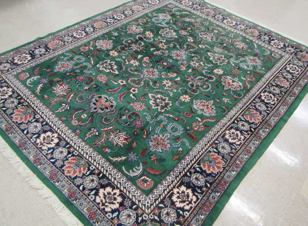 Appraisal: HAND KNOTTED ORIENTAL CARPET Indo-Persian featuring an overall floral decorated