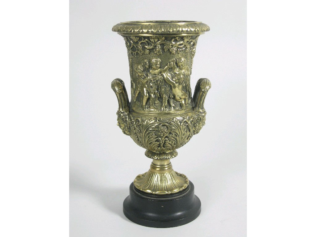 Appraisal: A Georgian brass two handled Urn Vase the handles with