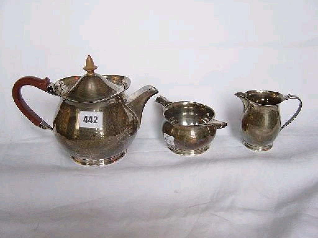 Appraisal: A silver tea set of modern baluster form with stylised