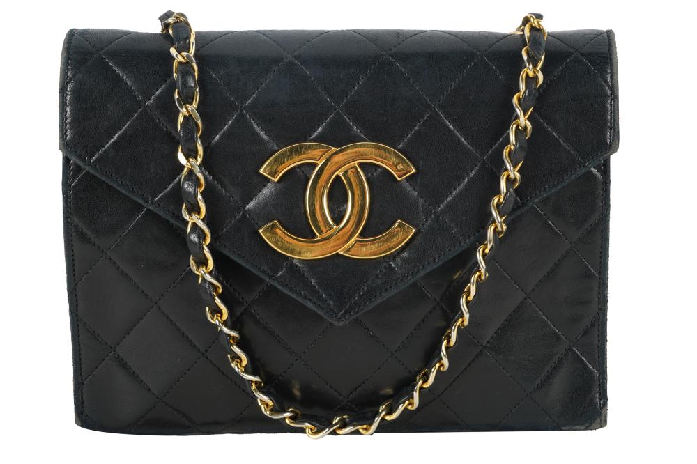 Appraisal: CHANEL QUILTED BAGCondition with worn leather from use inches wide