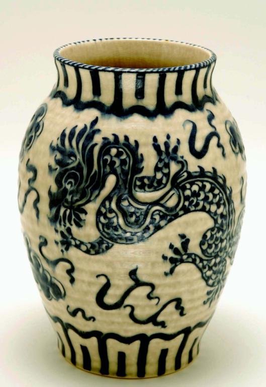 Appraisal: A large bulbous form Chinese-influenced vase designed by Charlotte Rhead