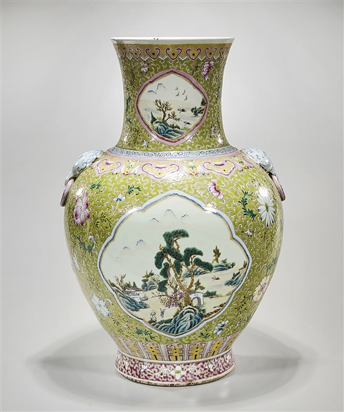 Appraisal: Tall Chinese enameled porcelain vase landscape scenes surrounded by floral