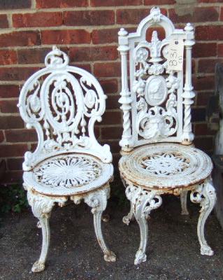 Appraisal: A cast iron single chair painted white together with another