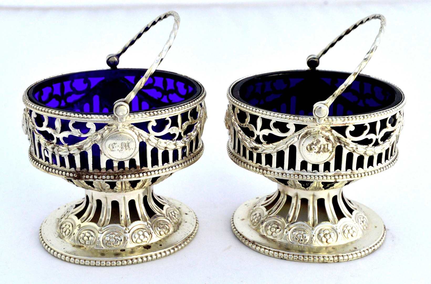 Appraisal: A pair of George III silver salts each of oval