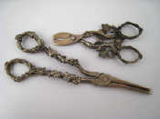 Appraisal: Two pairs of cast grape scissors one Italian silver assay