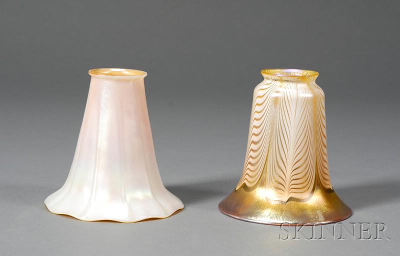 Appraisal: Two Art Glass Shades Early th century Quezal bell-form shade