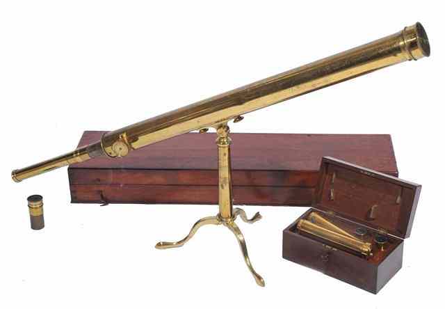 Appraisal: A VICTORIAN BRASS TELESCOPE on folding brass tripod within a