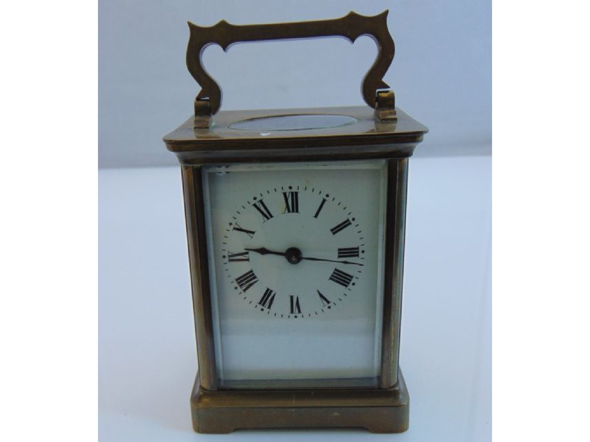 Appraisal: A simple French carriage clock with eight day timepiece