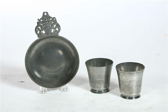 Appraisal: THREE PIECES OF PEWTER American th century Porringer with New