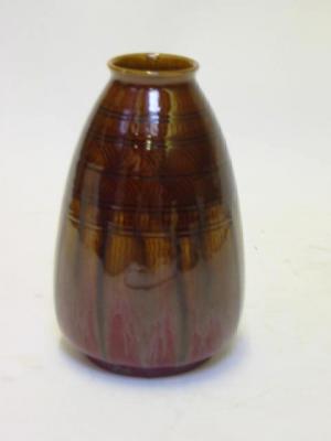 Appraisal: A LINTHORPE EARTHENWARE VASE designed by Christopher Dresser of ovoid