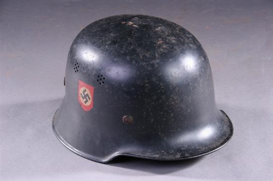 Appraisal: GERMAN WORLD WAR II MILITARY HELMET With liner and chin