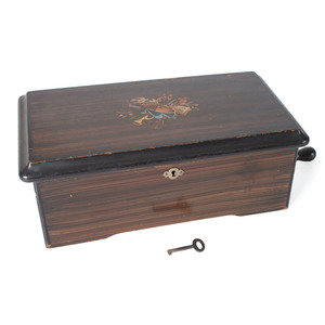 Appraisal: A Six Tune Cylinder Swiss Music Box with Rosewood Case