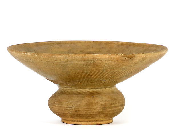 Appraisal: A Changsha green-glazed spittoon zhadou th century The compressed globular