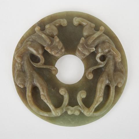 Appraisal: A Deep Green Jade Bi-Disc with Chilongs th Century Finely