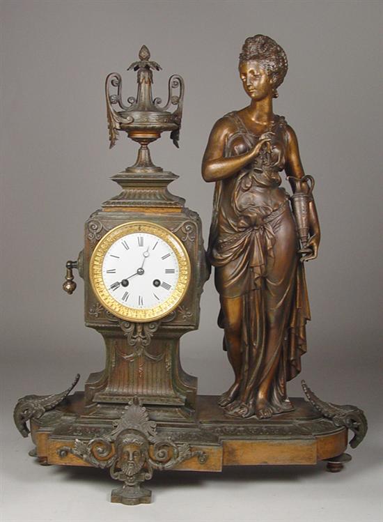 Appraisal: Spelter Figural Clock with Maiden Circa Figure standing beside clock