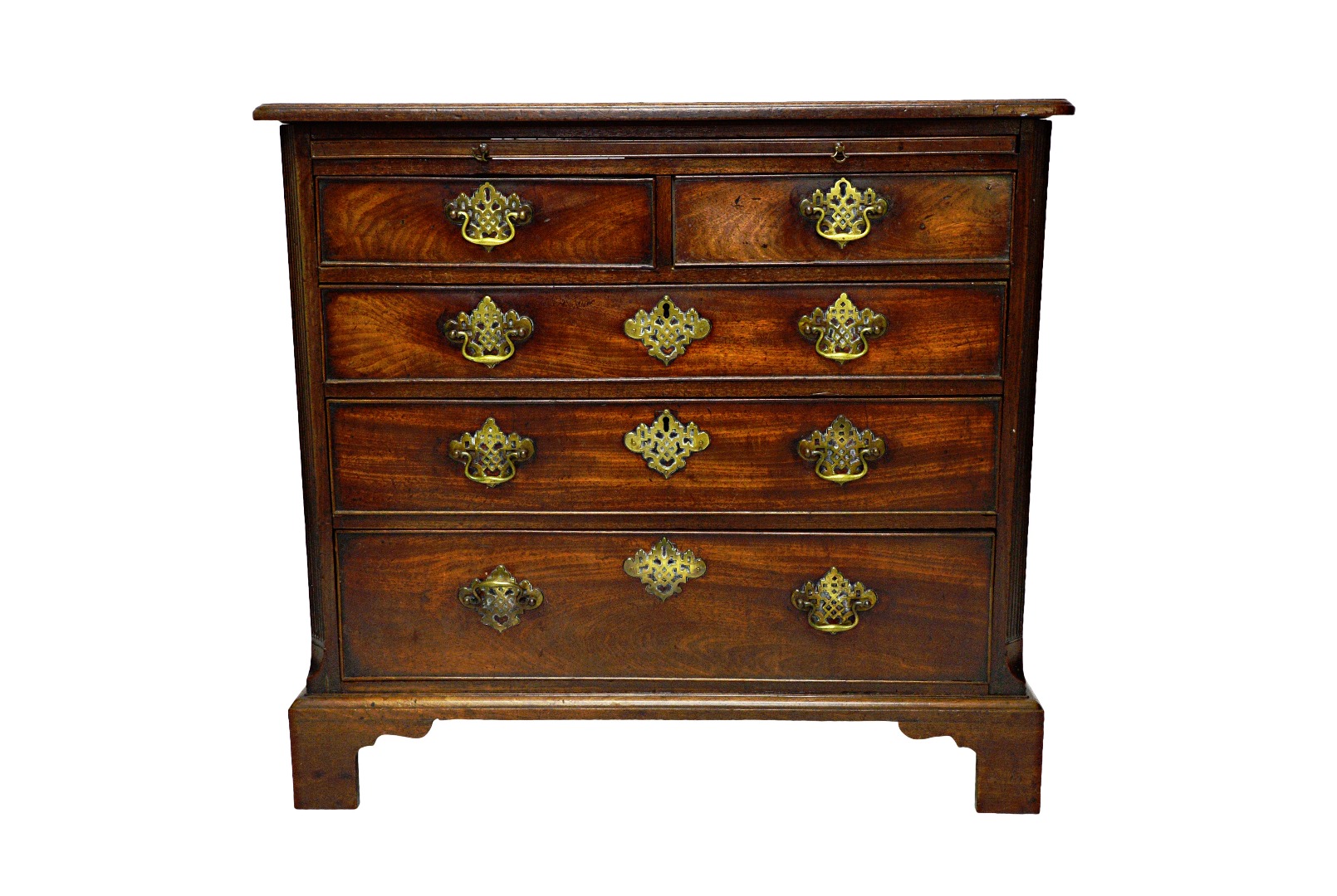 Appraisal: A small George III mahogany chest the brushing slide over