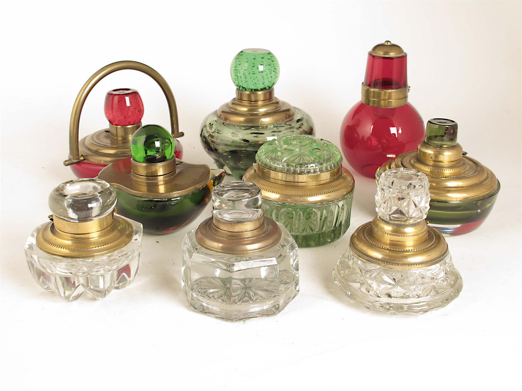 Appraisal: A small collection of glass and brass inkwells