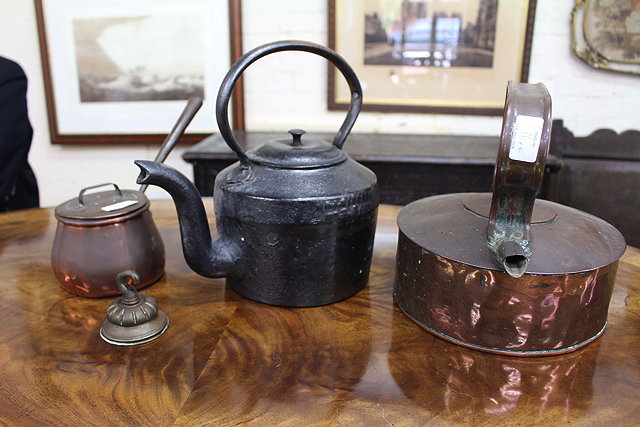 Appraisal: AN OLD COPPER KETTLE together with a small copper saucepan