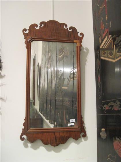 Appraisal: Chippendale style maple framed mirror The rectangular mirror plate enclosed