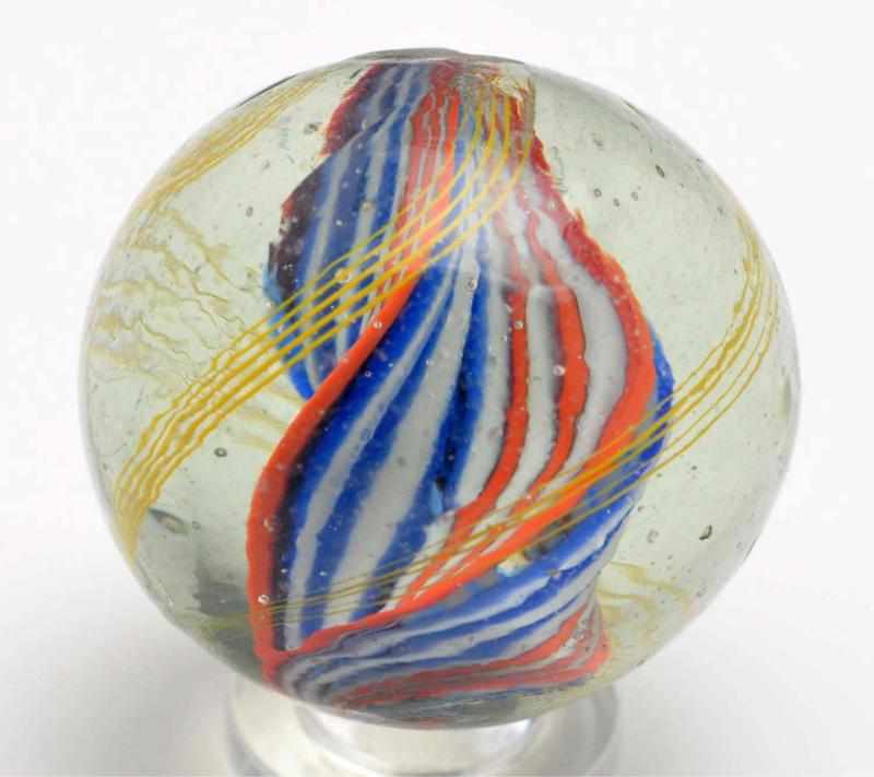 Appraisal: Divided Core Ribbon Swirl Marble Description Bright orange and blue