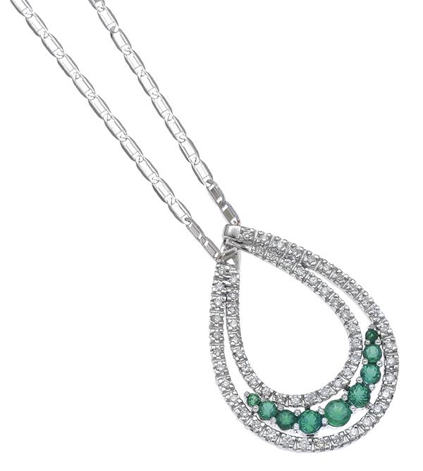 Appraisal: A COLOMBIAN EMERALD AND DIAMOND PENDANT Of open tear drop