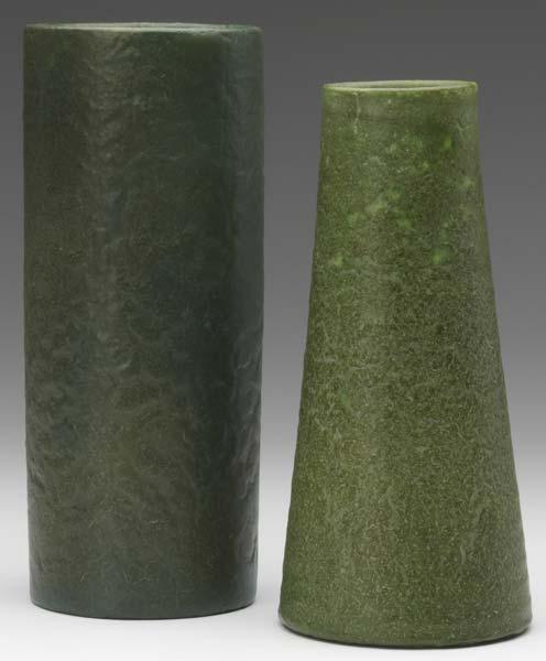 Appraisal: GRUEBY Two vases one cylindrical and one tapered both covered