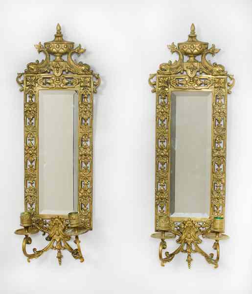 Appraisal: Bradley Hubbard Sconces American A pair of brass two-light mirrored