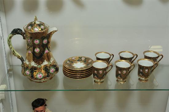 Appraisal: SEVEN PIECE CHINA CHOCOLATE SET Unattributed Extensively decorated with gilt