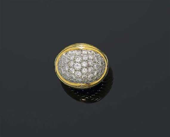 Appraisal: GOLD AND BRILLIANT-CUT DIAMOND RING Yellow and white gold Attractive