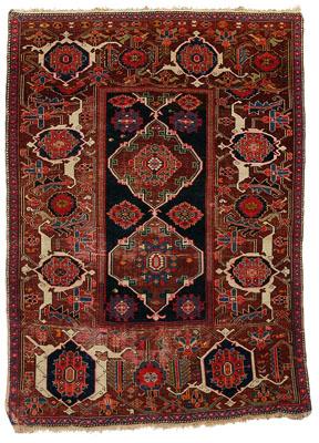 Appraisal: Caucasian rug central rectangular panel with two medallions on dark