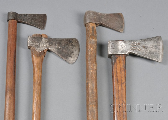 Appraisal: Four Tomahawks iron heads wood handles three with maker's touchmarks