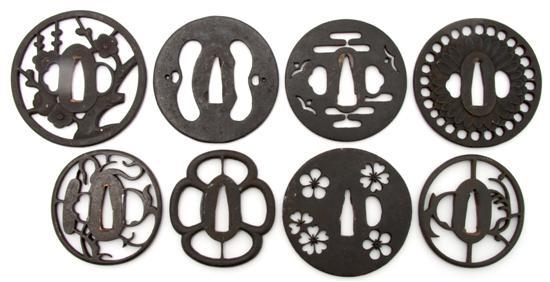 Appraisal: A Group of Eight Iron Tsuba comprised of one decorated