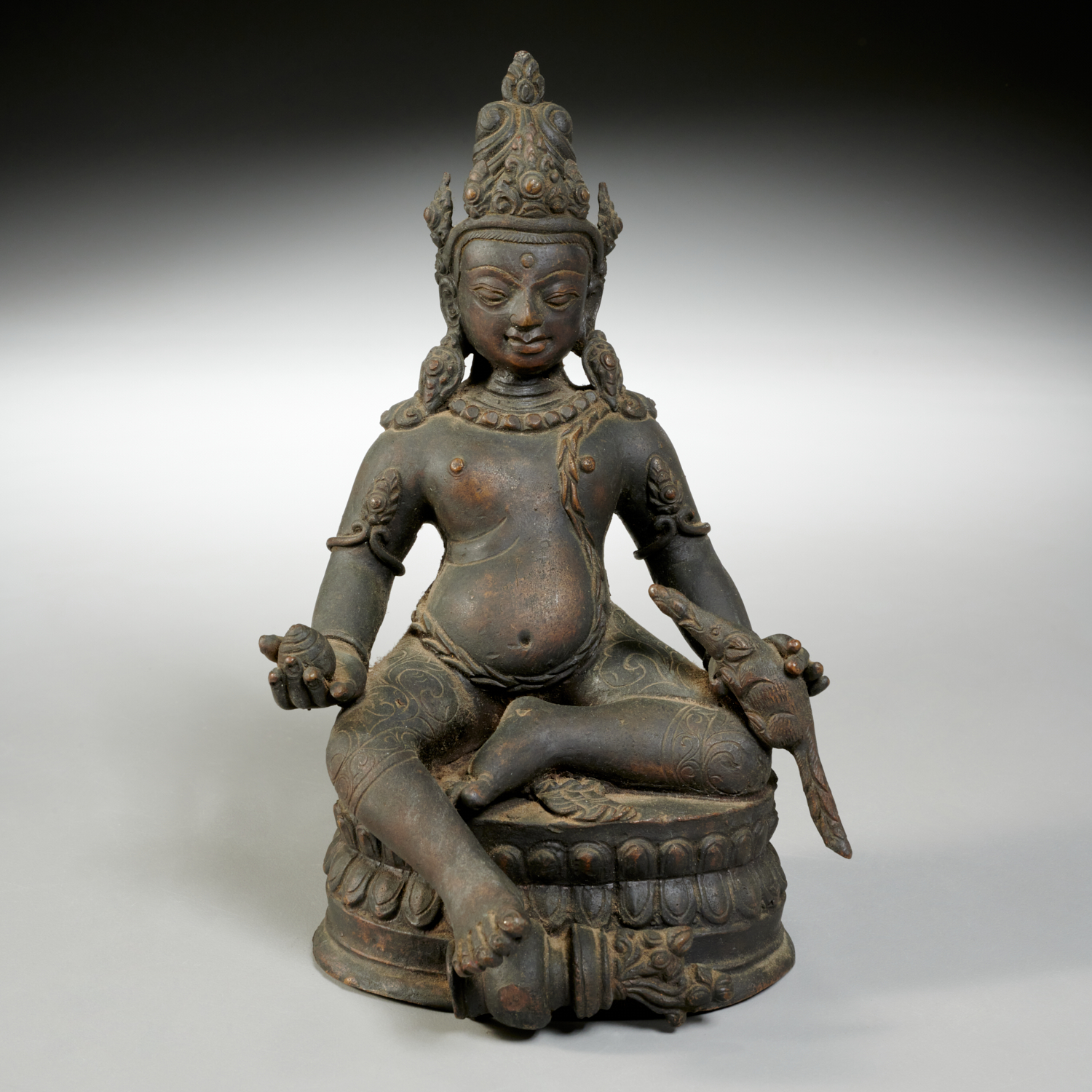 Appraisal: HIMALAYAN BRONZE FIGURE OF JAMBHALA th c probably Tibet dark