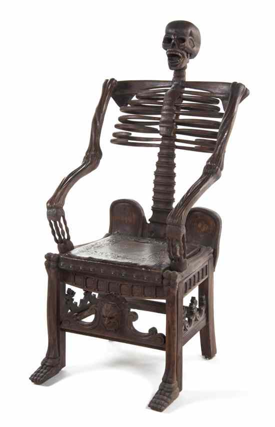 Appraisal: A Carved Pine Skeleton Chair having a skull above the