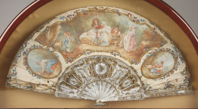 Appraisal: Hand painted fan features three scenes central scene depicts figures