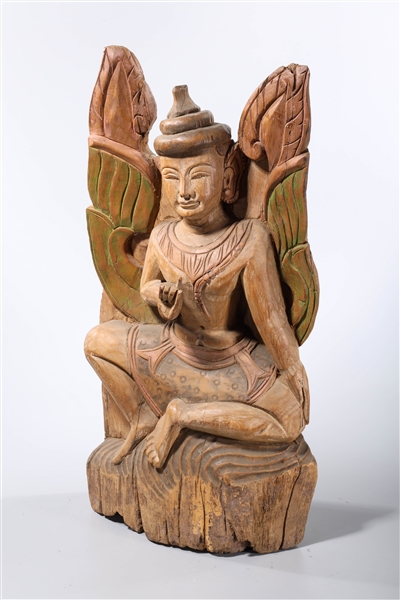 Appraisal: Southeast Asian wood seated sculpture x x approx