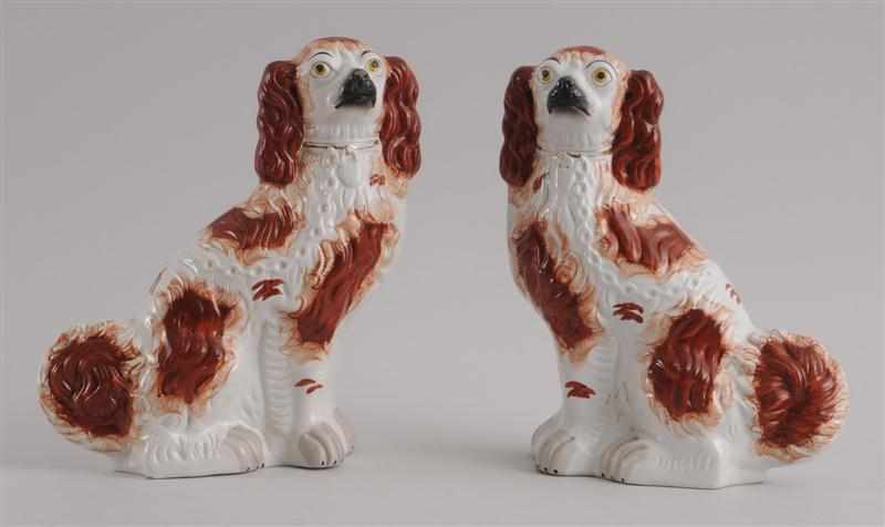 Appraisal: PAIR OF STAFFORDSHIRE SPANIELS A FIGURE OF ''WILL WATCH'' AND