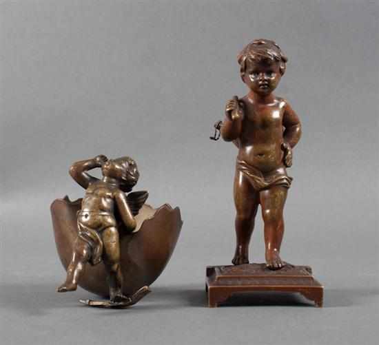 Appraisal: French bronze figural match holder and a figural decorative piece